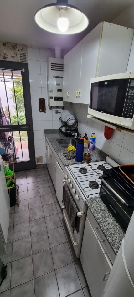 Venta Departamento 2 Ambientes, Con Cochera y Jardin